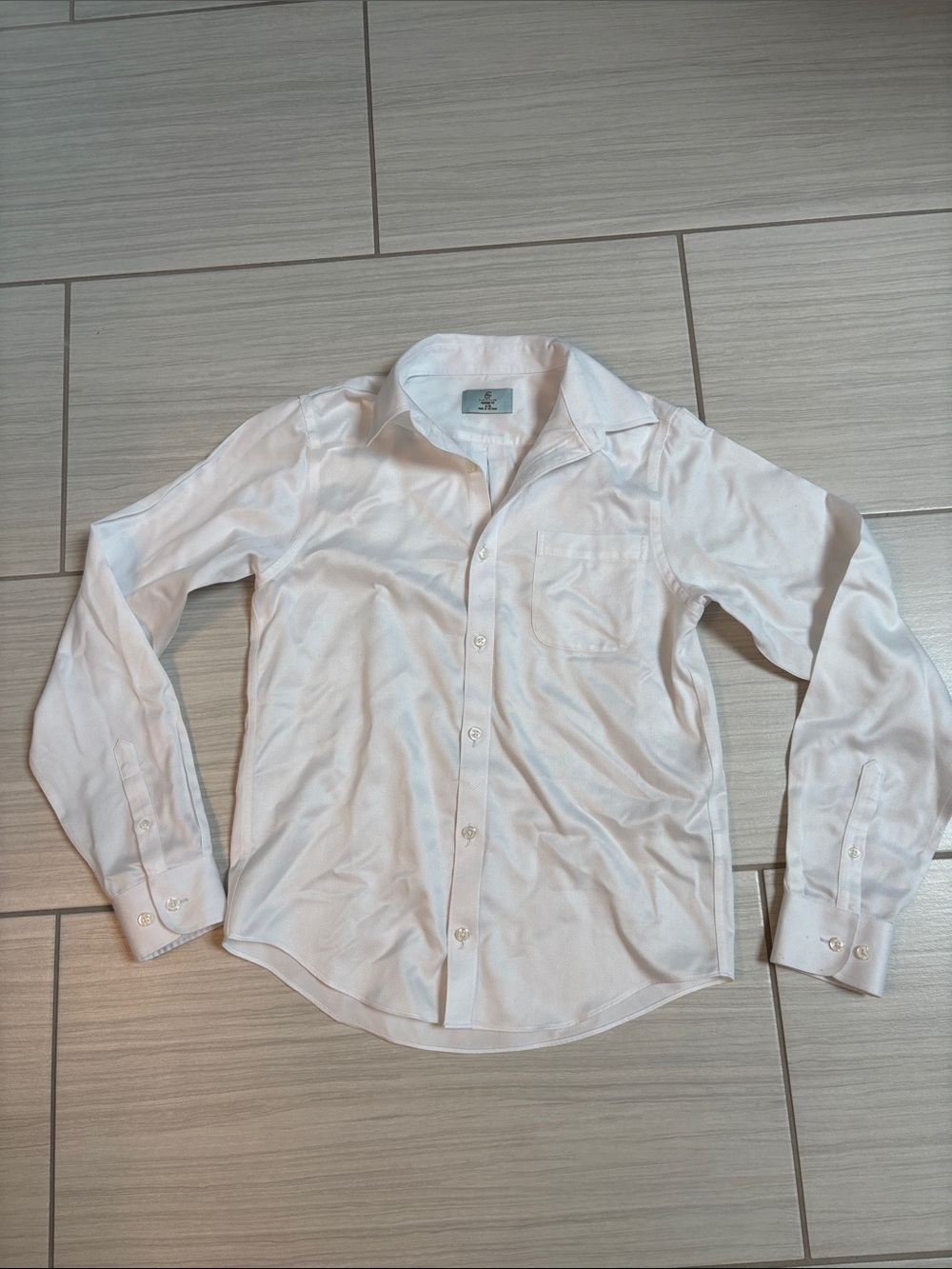 Classic White Boys Dress Shirt - Long Sleeve from Dillard’s Herringbone pattern.